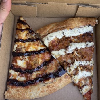 Madhouse Pizza - two slices of pizza in a box - Pizza Near Me - Delta, British Columbia Madhouse Pizza - two slices of pizza in a box - Pizza Near Me - Delta, British Columbia