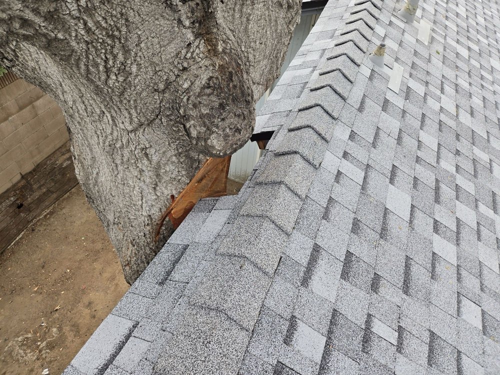 Slide of Musulman Roofing