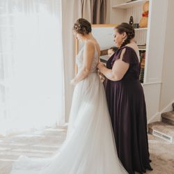 I Do Bridal - My best friend getting me in the dress.