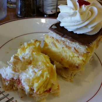 Danish Mill Bakery - Inside Napoleon - all whipped fluff with hard as heck puff pastry shell. - Bakeries Near Me - Solvang, California Danish Mill Bakery - Inside Napoleon - all whipped fluff with hard as heck puff pastry shell. - Bakeries Near Me - Solvang, California