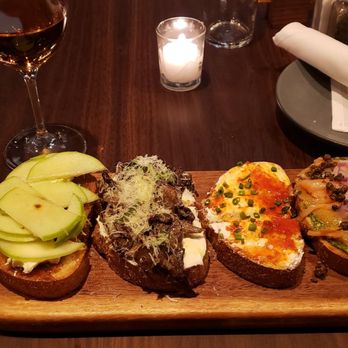 Postino Addison - Bruschetta Board: brie, apple, fig spread / mushroom mascarpone / sweet and spicy pepper jam, goat cheese / smoke salmon, pesto - Wine Bars Near Me - Dallas, Texas Postino Addison - Bruschetta Board: brie, apple, fig spread / mushroom mascarpone / sweet and spicy pepper jam, goat cheese / smoke salmon, pesto - Wine Bars Near Me - Dallas, Texas