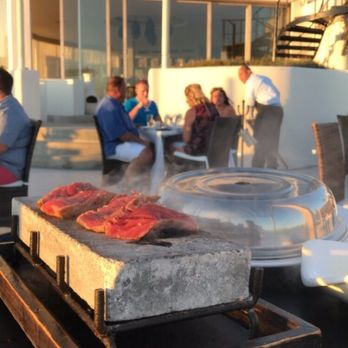 Sunset Monalisa - Lava Rock grilled filet with table side presentation - Mediterranean Near Me - Cabo San Lucas, BCS Sunset Monalisa - Lava Rock grilled filet with table side presentation - Mediterranean Near Me - Cabo San Lucas, BCS
