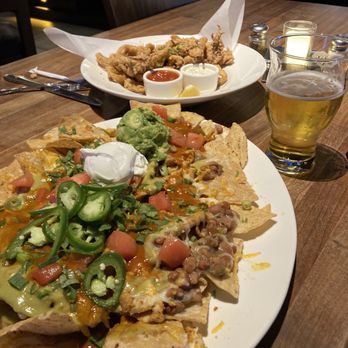 Yard House - Chicken nachos and calamari - New American Near Me - Sacramento, California Yard House - Chicken nachos and calamari - New American Near Me - Sacramento, California