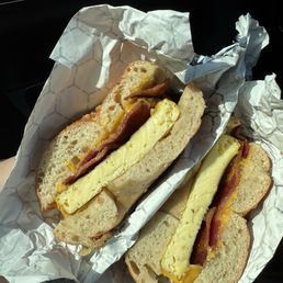 Egg sandwich on Truffle Parmesan bagel with bacon and cheddar cheese