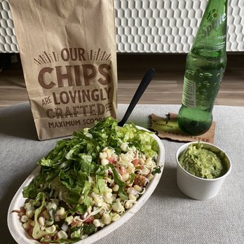 Chipotle Mexican Grill - Chicken Burrito Bowl Chips and Guacamole - Fast Food Near Me - Seattle, Washington Chipotle Mexican Grill - Chicken Burrito Bowl Chips and Guacamole - Fast Food Near Me - Seattle, Washington
