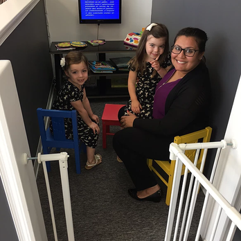 Epoch Chiropractic - Dr. Patel catching a movie with some of our younger patients in the play area. - Chiropractors Near Me - Wilmington, Delaware