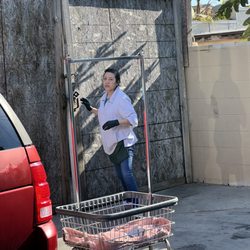 Launderland Wash & Dry - Worker that caused damage to her customer's vehicle in the parking lot.