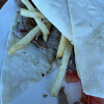 Doner Corner - I really bought photo, but it's the doner plate- beef and lamb meat, french fries, tomato, onion, pita- the meat is really flavorful - Mediterranean Near Me - Los Angeles, California