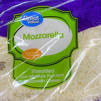 Walmart - a bag of shredded cheese - A plastic bag containing shredded mozzarella cheese with purple and green packaging. The label indicates it is shredded, low-moisture part-skim mozzarella cheese, and includes branding from Great Value. The packaging also notes it is a good source of protein and displays an expiration date of August 31, 2023. - Grocery Near Me - Warwick, Rhode Island