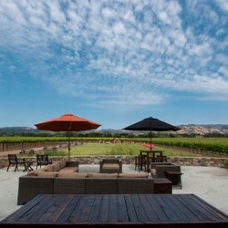 Foley Johnson Winery - Casual outdoor seating allows guests to enjoy wines while marveling at the views.