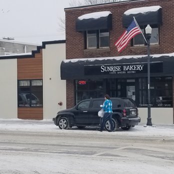 Sunrise Bakery - a man on a motorcycle in front of a building - Bakeries Near Me - Hibbing, Minnesota Sunrise Bakery - a man on a motorcycle in front of a building - Bakeries Near Me - Hibbing, Minnesota