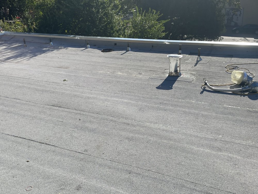 Slide of John Stahl Roofing