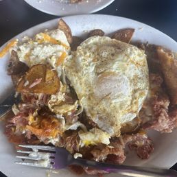 Corn Corned Beef Hash with over easy egg