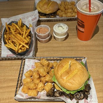 Smashburger - TRUFFLE MUSHROOM SMASH with Nashville SCORCHIN HOT FRIES. CHICKEN SMASH BURGER with TOTS. - Fast Food Near Me - Nampa, Idaho