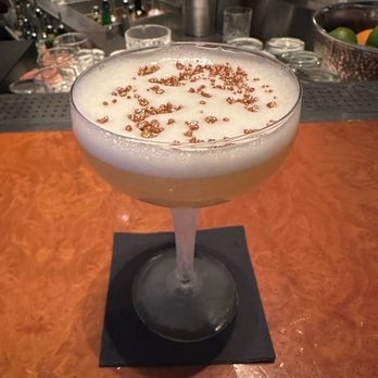 MOMO - White chocolate gin cocktail with gold pop rocks on top - Asian Fusion Near Me - Amsterdam, New Hampshire MOMO - White chocolate gin cocktail with gold pop rocks on top - Asian Fusion Near Me - Amsterdam, New Hampshire
