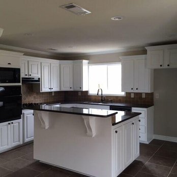 H2 Renovations & Contracting - a kitchen in a home - Painters Near Me