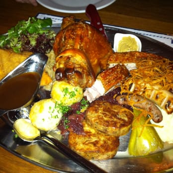 Hofbrauhaus - Selection of pork knuckle, pork belly, sausages, schnitzel, served with sauerkraut, red cabbage, & mashed potatoes - German Near Me - Melbourne, VIC Hofbrauhaus - Selection of pork knuckle, pork belly, sausages, schnitzel, served with sauerkraut, red cabbage, & mashed potatoes - German Near Me - Melbourne, VIC