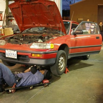 Max Motors - Ruben checks under my car while some other customers talk to Joaquin about a stalled vehicle they needed to retrieve - Auto Repair Near Me - San Carlos, California