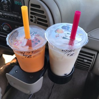 Fay’s Cafe - Almond Milk Tea, on right, and it has shredded almonds in it!! Drink on the left is Thai Tea. - New American Near Me - Albany, Oregon