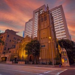 First Methodist Houston - Exterior view from the corner of Main and Clay, showing the church outside at night.