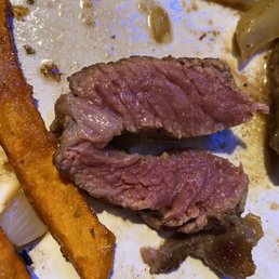 This is not medium rare steak. It's super chewy too. This is not medium rare steak. It's super chewy too.