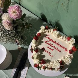 10" heart shaped cake, champagne with strawberry curd and strawberry buttercream