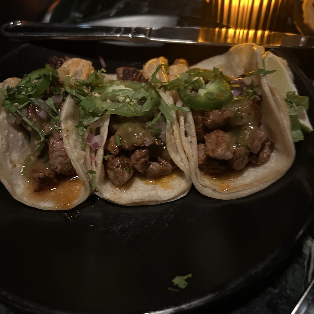 The Botanist - Steak tacos- very tasty. Juicy and flavorful without being greasy. - Cocktail Bars Near Me - Bakersfield, California The Botanist - Steak tacos- very tasty. Juicy and flavorful without being greasy. - Cocktail Bars Near Me - Bakersfield, California