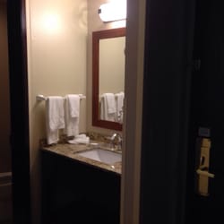 Sink and toilet/shower are separated by a door