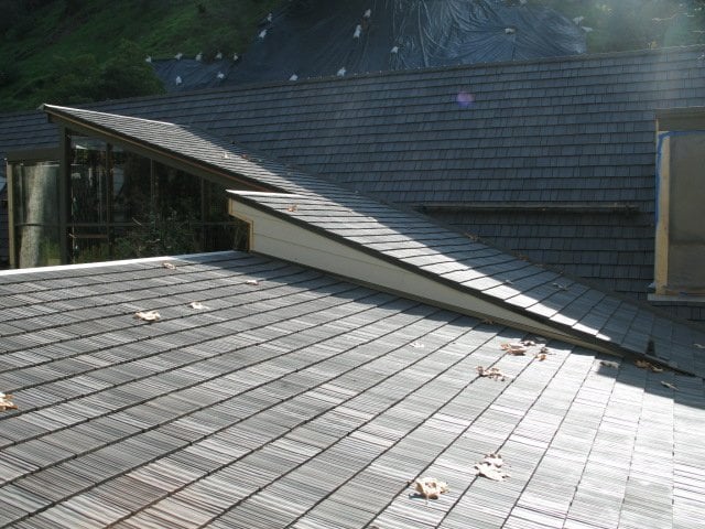 Slide of Economy Roofing
