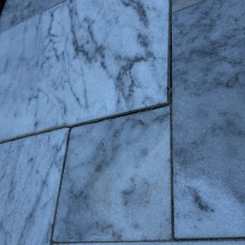 Blue Escapes Pool & Spa - uneven paver with gaps, again after "fixing" it. - Pool Cleaners Near Me - Plano, Texas