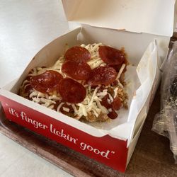 KFC - KFC'S New Chizza this thing was perfect crispy with marinara sauce and pepperoni and cheese. Talk about excellence this was excellence.