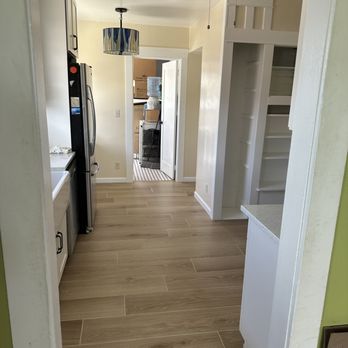 Affordable HandyMan - new kitchen floors and pendant light. Repainted pantry. - General Contractors Near Me