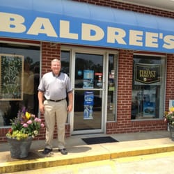 Baldree's Tire & Service - Bill out front of the shop.