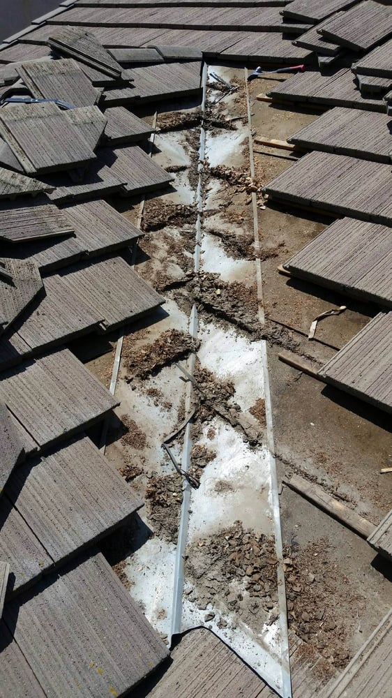 Slide of Noble H Brown Roofing & Gutters