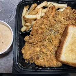 Country fried steak with country gravy Country fried steak with country gravy