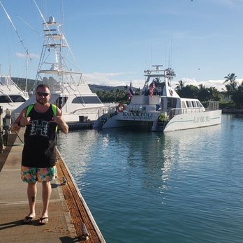 Ocean Joy Cruises - My husband and the gorgeous catamaran - Tours Near Me - Kapolei, Hawaii Ocean Joy Cruises - My husband and the gorgeous catamaran - Tours Near Me - Kapolei, Hawaii