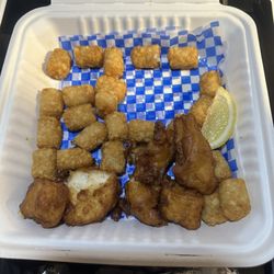 Midway Bar & Grill - This is the Fish &. Chips I got as a take out . Got home and opened the container to this crap
