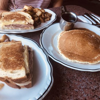 Main Street Cafe - Split of the breakfast sandwich and a short stack. - Breakfast & Brunch Near Me - Fallbrook, California