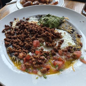 Famous Toastery - Huevos Ranchero with side of home fries - Breakfast & Brunch Near Me - Concord, North Carolina