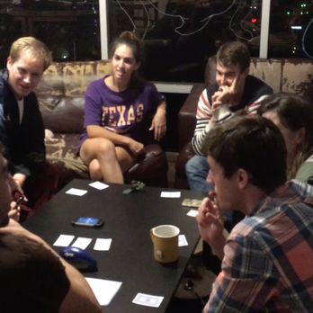 College Houses - Halstead House: Card game night in the kitchen - Apartments Near Me - Austin, Texas College Houses - Halstead House: Card game night in the kitchen - Apartments Near Me - Austin, Texas