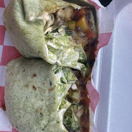 Cheesesteak, veggies with a jerk-style sauce.