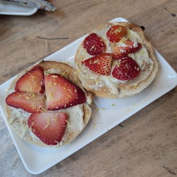 Oromo Cafe Bucktown - Plain bagel with cashew cream cheese fresh strawberries and lemon zest - Cafes Near Me - Chicago, Illinois Oromo Cafe Bucktown - Plain bagel with cashew cream cheese fresh strawberries and lemon zest - Cafes Near Me - Chicago, Illinois