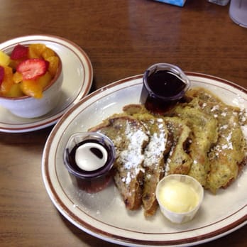 Weck's - Raisin cinnamon French Toast w a side of fruit #balanceisimportant - Breakfast & Brunch Near Me - Albuquerque, New Mexico Weck's - Raisin cinnamon French Toast w a side of fruit #balanceisimportant - Breakfast & Brunch Near Me - Albuquerque, New Mexico