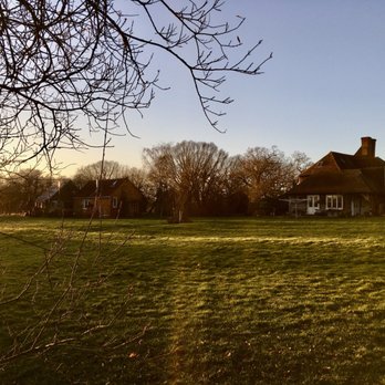 The Lodge - View from the pond to the Lodge (left) with the farmhouse on the right. - Vacation Rentals Near Me - Warehorne, KEN