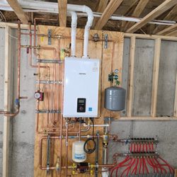 Innovative Mechanical - Tankless with floor grid!