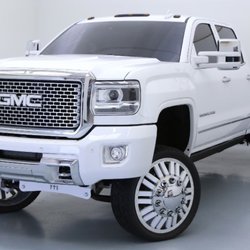 Show Off Motorsports - 2016 Gmc 3500 Built for SEMA Auto show 4'' lift kit 24'' American force Wheels fully color matched with Amp Research power steps