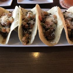 Mug Pub - Steak Street Tacos: $2 each on Tuesdays