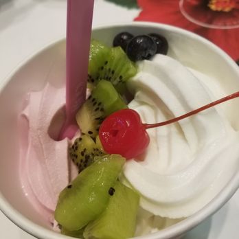 Yogurtland - Hibiscus Pear Tart and Original Tart with some kiwi and blueberry toppings. - Ice Cream & Frozen Yogurt Near Me - Orem, Utah