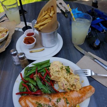 Tinleaf Fresh Kitchen - Salmon plate with sugar snap peas and potato salad.  Order of fries with curried catchup. - New American Near Me - Carlsbad, California