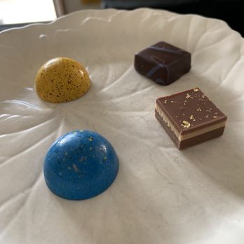 andSons Chocolates - passion fruit caramel, dark chocolate, speculoos cookie and hazelnut gianduja - Chocolatiers & Shops Near Me - Beverly Hills, California andSons Chocolates - passion fruit caramel, dark chocolate, speculoos cookie and hazelnut gianduja - Chocolatiers & Shops Near Me - Beverly Hills, California